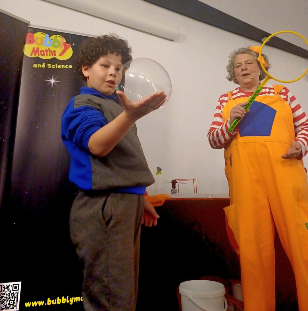 2411 setu carlow holding a bubble